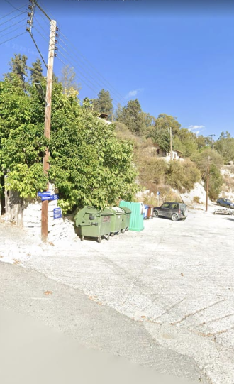 Open parking area near Serenity Luxury Boutique Houses in Vouni